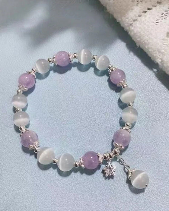 Bracelet imitation œil de chat cristal de papillon