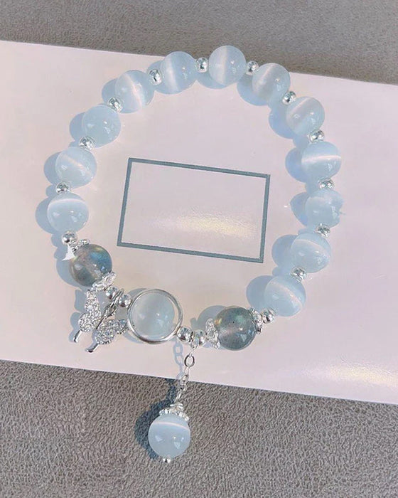 Bracelet imitation œil de chat cristal de papillon