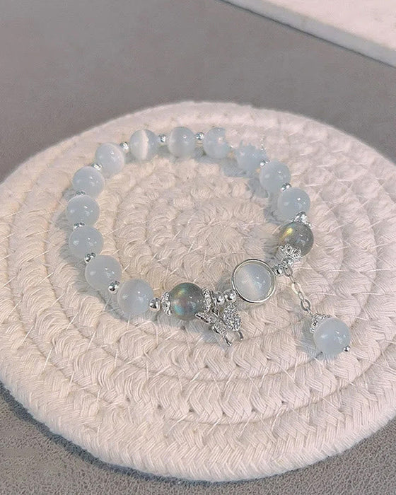 Bracelet imitation œil de chat cristal de papillon