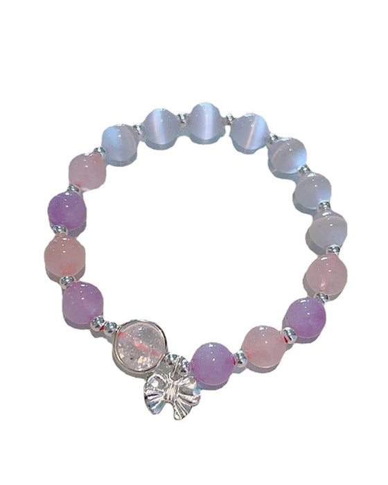 Bracelet imitation œil de chat cristal de papillon