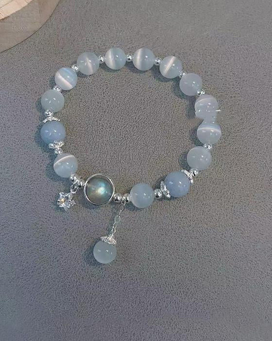 Bracelet imitation œil de chat cristal de papillon