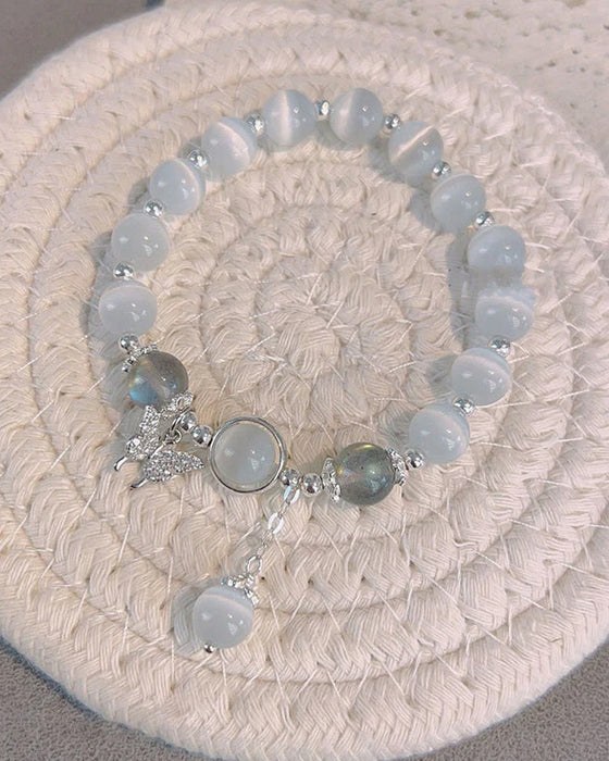 Bracelet imitation œil de chat cristal de papillon