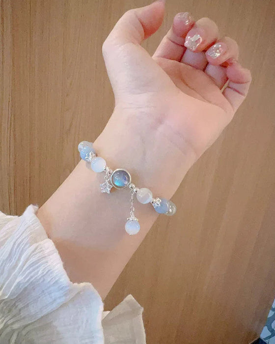 Bracelet imitation œil de chat cristal de papillon