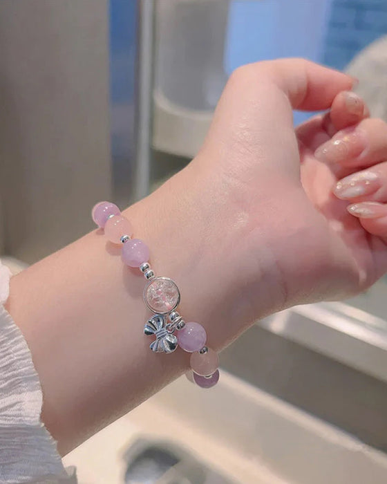 Bracelet imitation œil de chat cristal de papillon