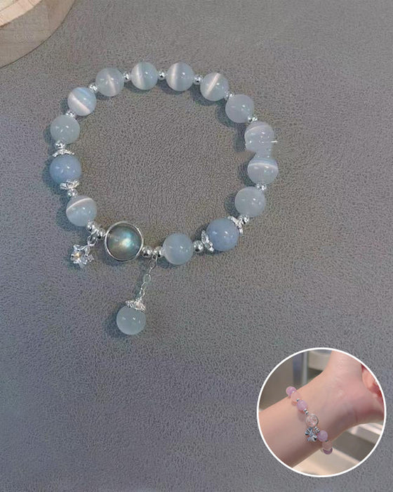 Bracelet imitation œil de chat cristal de papillon