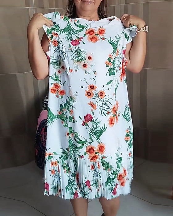 Robe plissée à imprimé floral et à empiècements