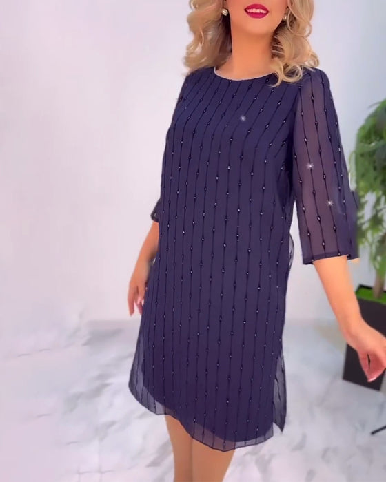 Robe Unie Plissée