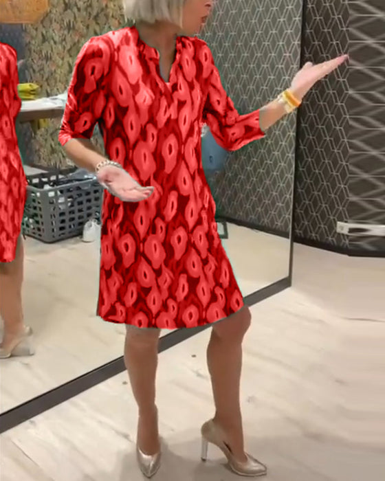 Robe imprimée à col en V et manches trois-quarts