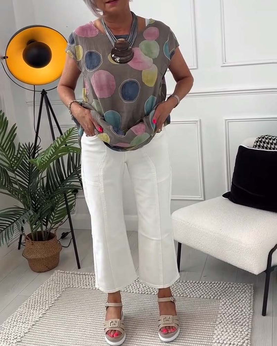 Blouse imprimée à pois colorés