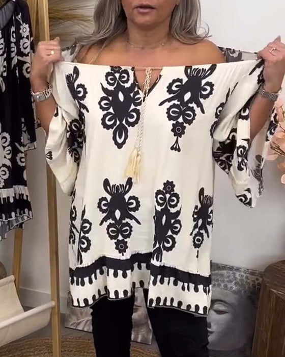 Blouse à décolleté en bandoulière et coupe lâche