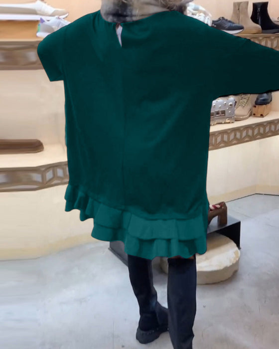 Robe à la silhouette élégante et aux manches longues