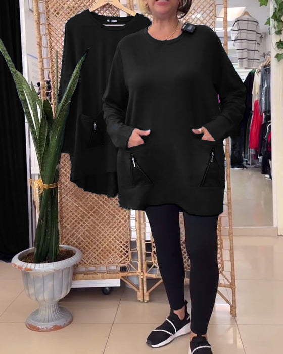 Sweat col rond couleur unie poche zippée