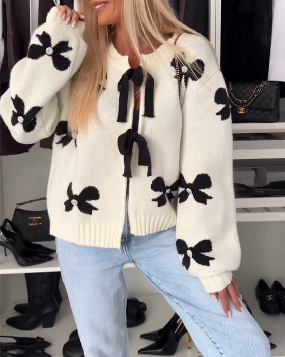 Cardigan à lacets avec perles et nœud