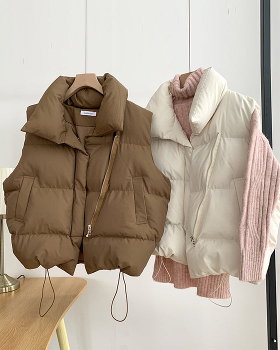 Veste matelassée simple sans manches avec poche zippée de couleur unie