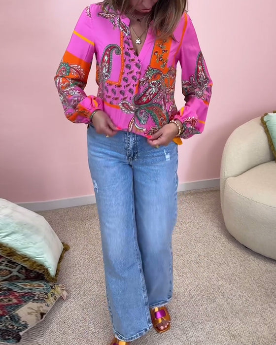 Chemisier imprimé à la mode à manches longues et col en V