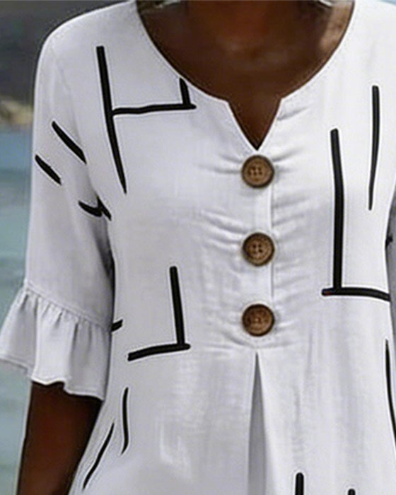 Robe À Lignes Géométriques Avec Décolleté En V