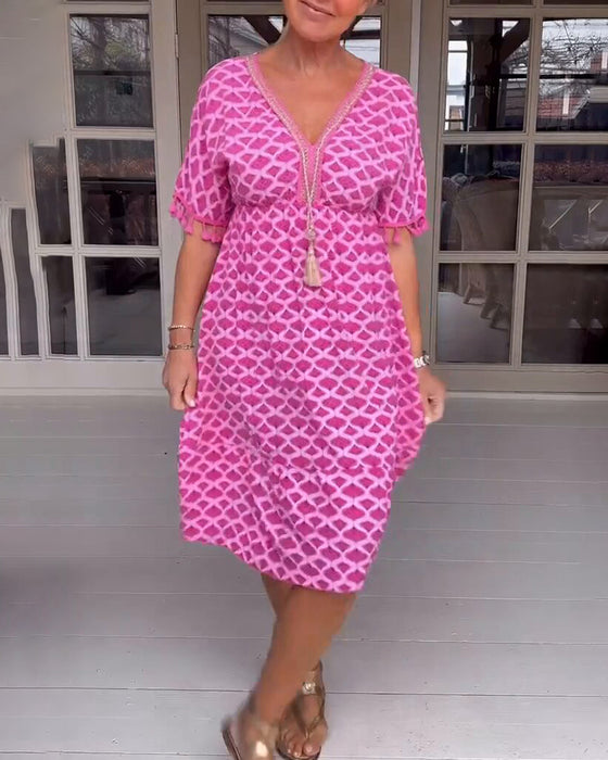 Robe col V imprimée à franges