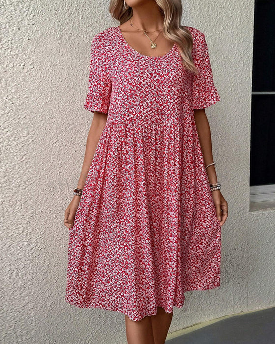 Robe élégante à col rond et imprimé floral