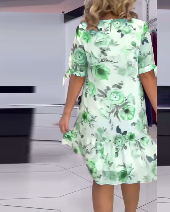Robe élégante à col rond et imprimé floral