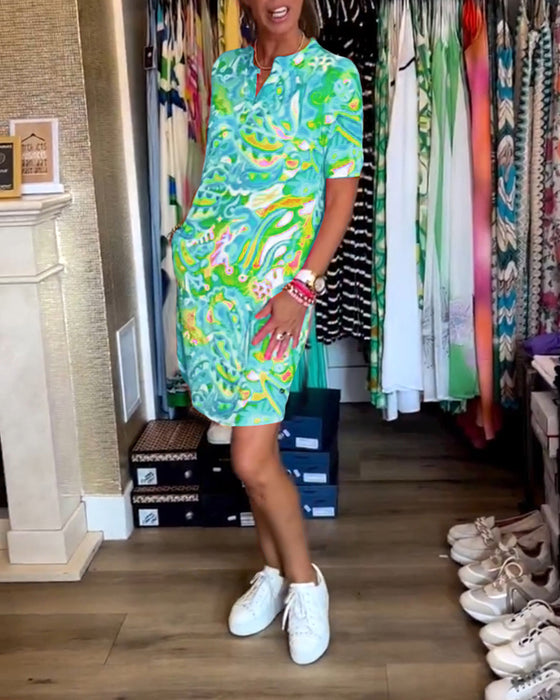 Robe avec poches et imprimés et manches courtes