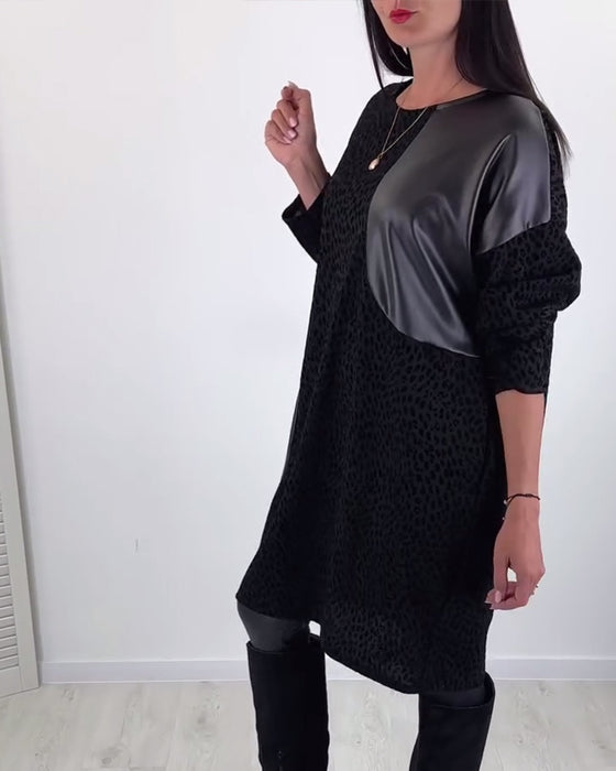 Robe élégante à empiècements et col rond