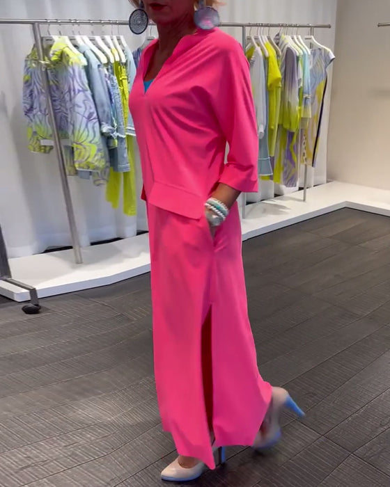 Robe couleur unie fendue à col V