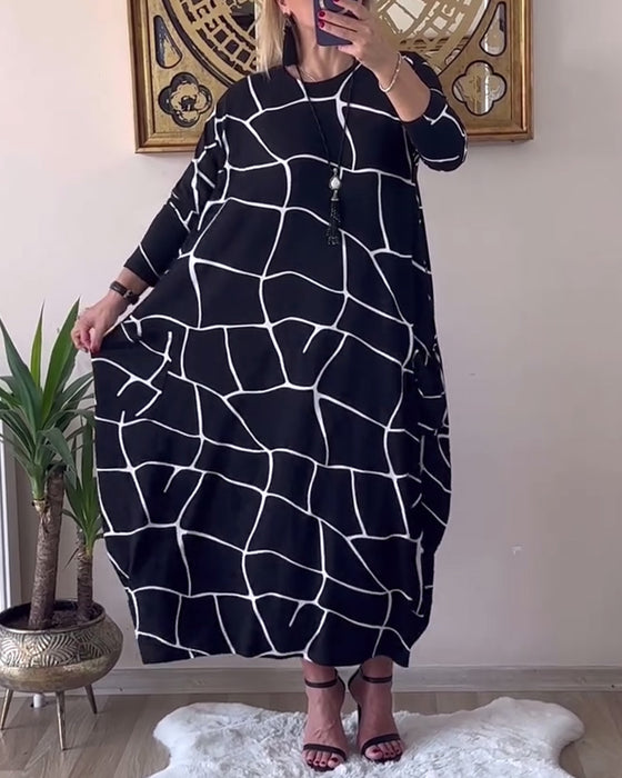 Robe col rond manches longues poche ample