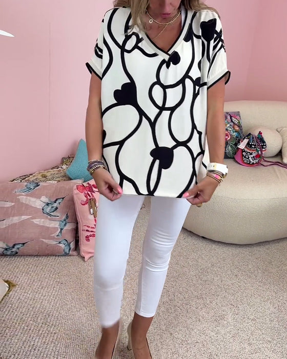 Haut décontracté à manches courtes et col en V imprimé contrasté