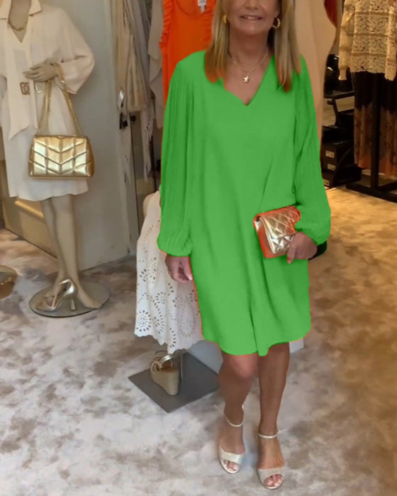 Robe col en V à manches lanternes de couleur unie