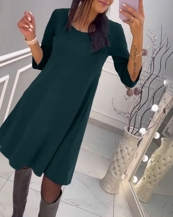 Robe unie avec nœud au dos