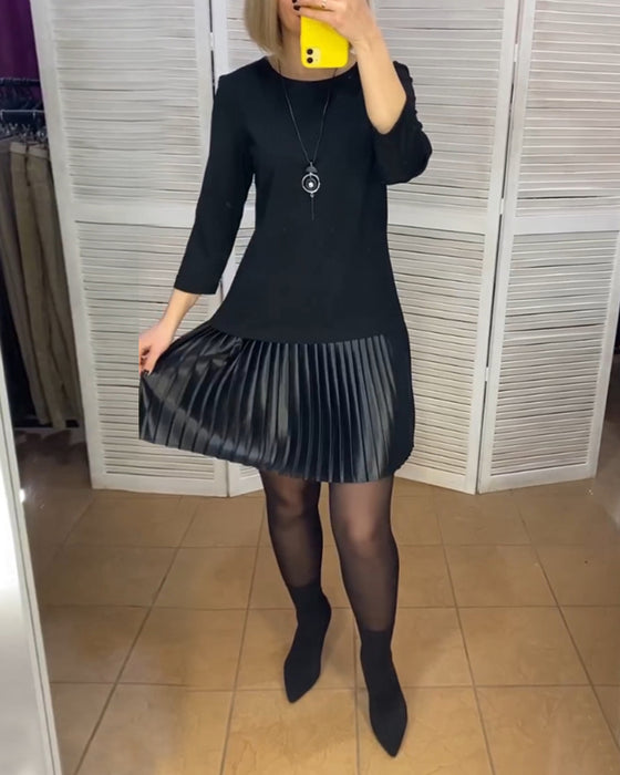 Robe à pans plissés et couleurs unies