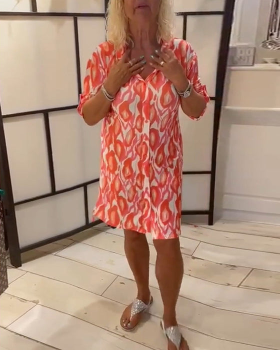 Robe avec boutons et manches centrales avec revers