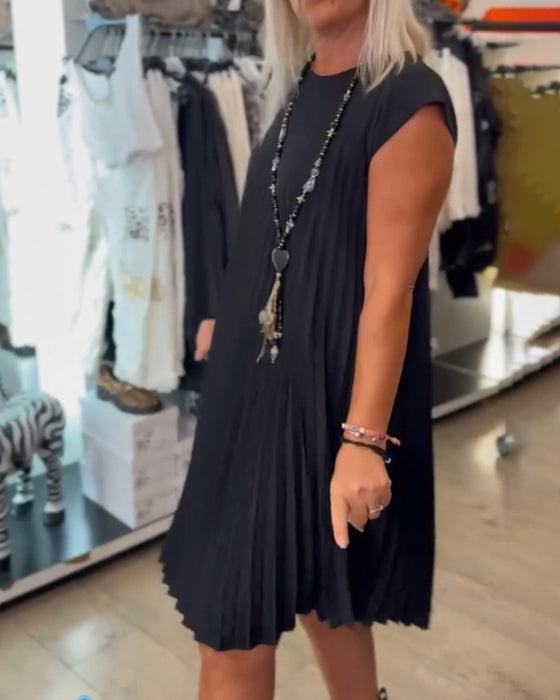 Robe décontractée plissée de couleur unie à col rond