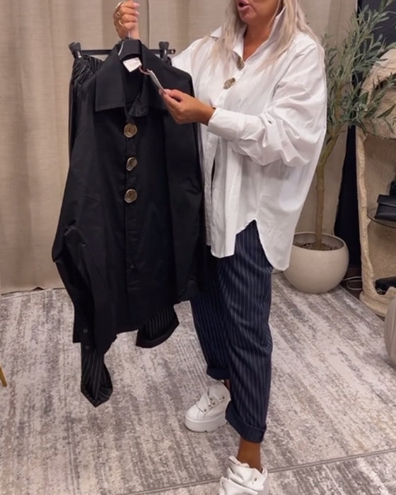 Chemise élégante de couleur unie avec revers et boutons