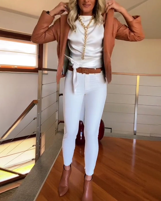 Haut uni plissé sans manches noué