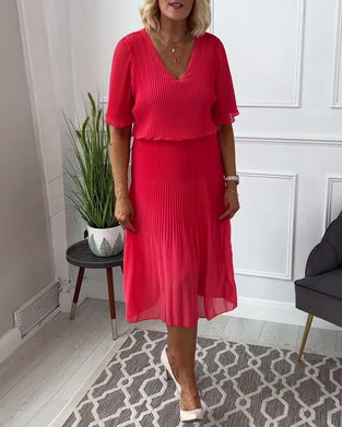 Robe plissée décontractée à col en V et demi-manches de couleur unie