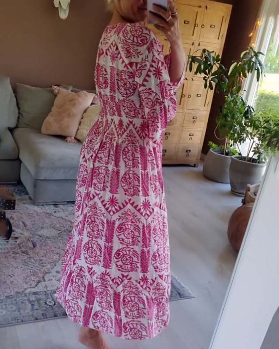 Robe élégante imprimée à col en V et manches cloche plissées