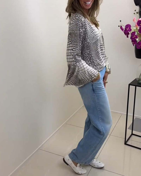 Blouse à motif floral et lanière