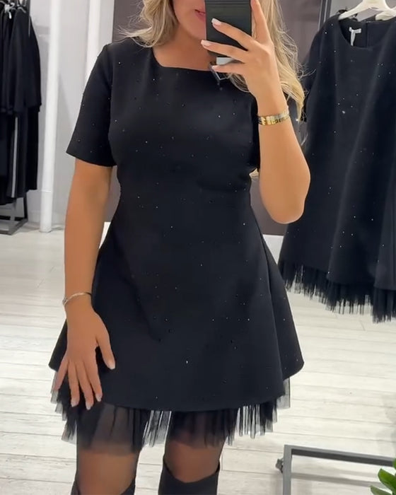 Robe élégante en patchwork de maille scintillante