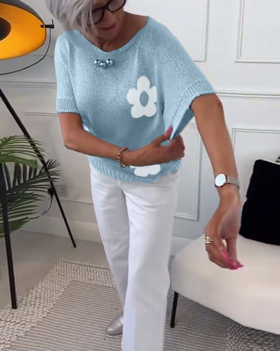 Pull col rond slim fleuri