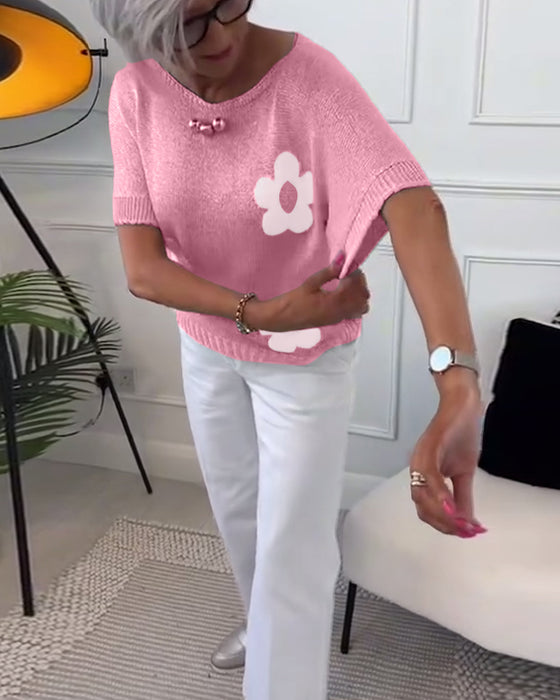 Pull col rond slim fleuri