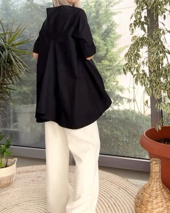 Haut de couleur unie style de déplacement