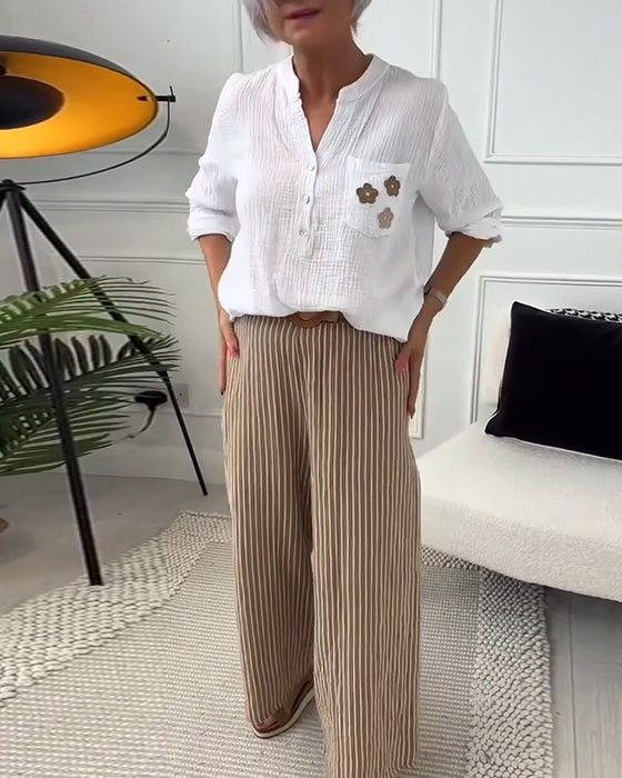 Blouse décontractée à manches longues et poche à imprimé floral