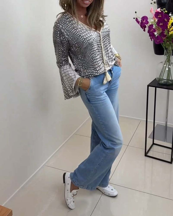 Blouse à motif floral et lanière