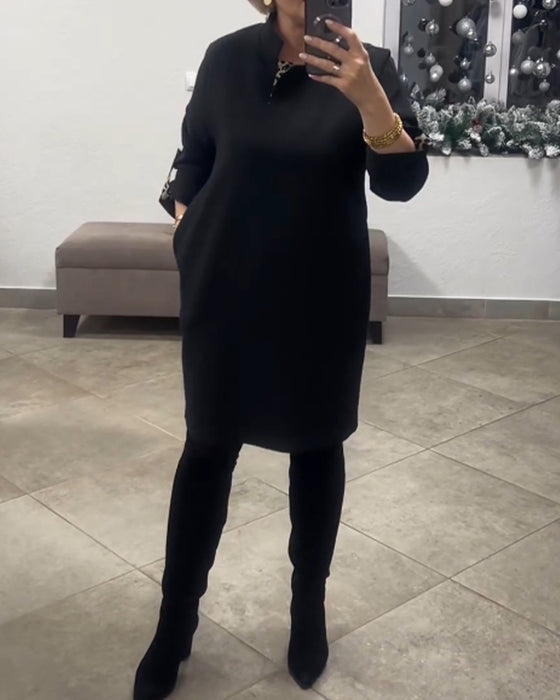 Robe à col montant de couleur unie