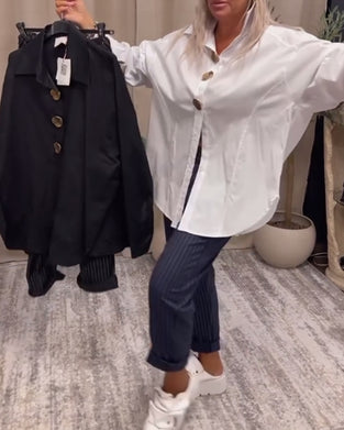 Chemise élégante de couleur unie avec revers et boutons