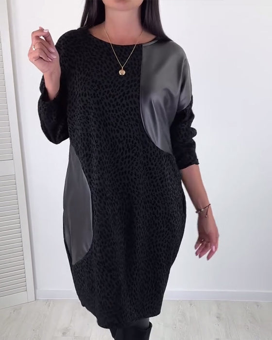 Robe élégante à empiècements et col rond