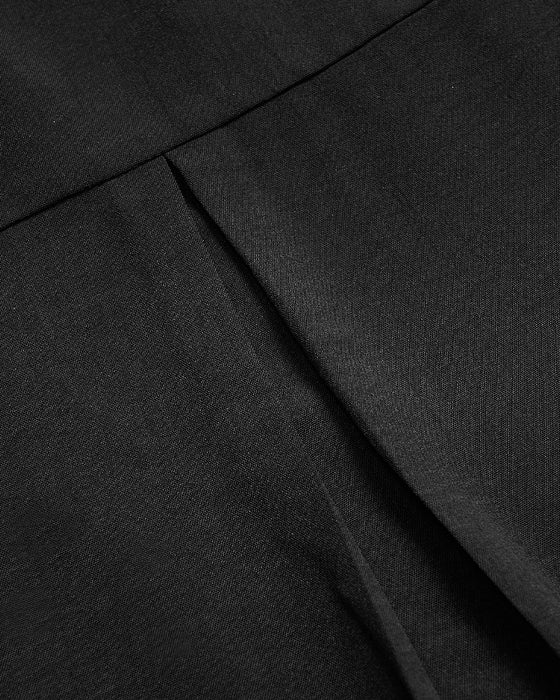 Haut décontracté à empiècements et boutons à sequins