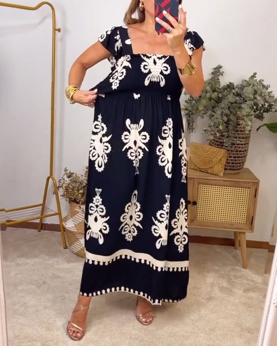 Robe élégante plissée imprimée à col carré