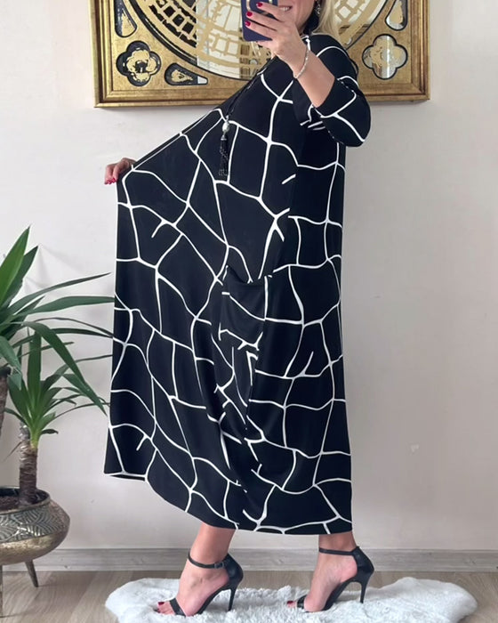 Robe col rond manches longues poche ample